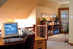 loft area with computer desk