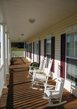 symmetrical country home's covered porch