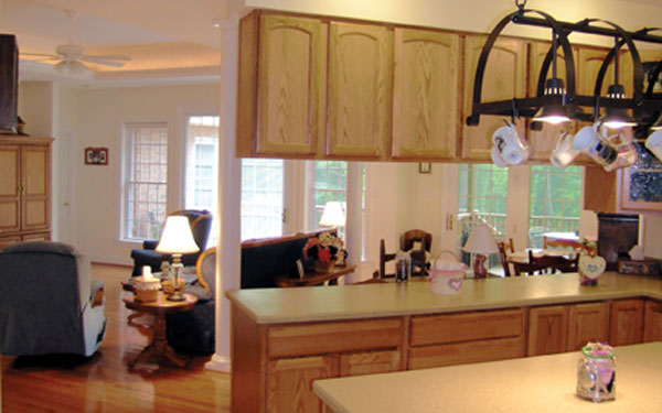 warm hued galley style kitchen