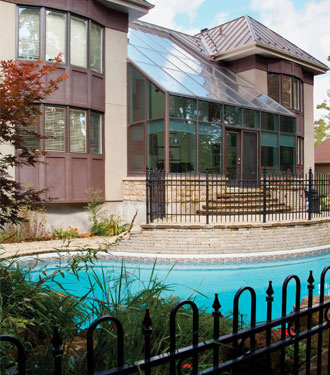 house with swimming pool and surrounding fence