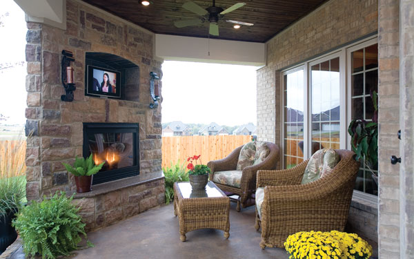 outdoor covered patio with flat screen television