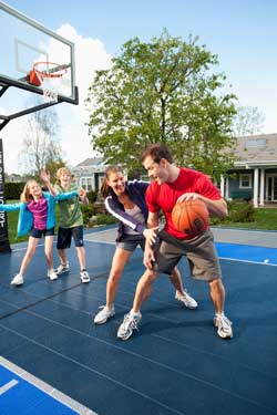 family playing basketball