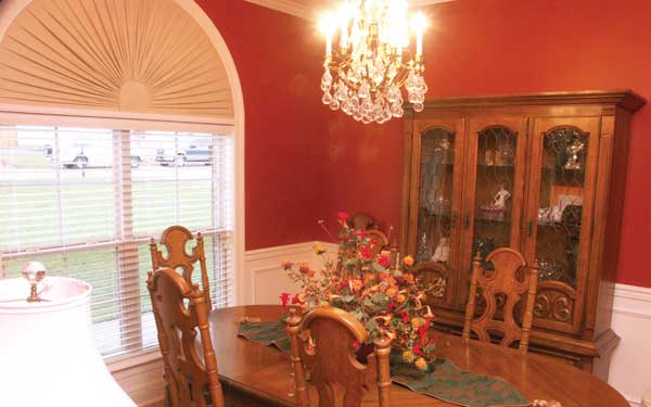 dining room with country style hutch