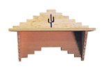 This shelf has a cactus desighn carved into the center for Southwestern style