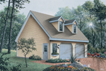 Appealing two-car garage has twin dormers on roof for added charm