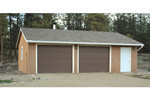 This garage can hold two and half cars and has a door and side window