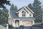 Classic residential style has been achieved with this two-story apartment garage with large arched window