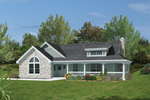 Cottage style home with stone accent wall and covered front porch