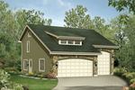 Two-car garage and RV garage structure withstone front façade and living space above