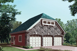Stone covered three-car garage with living space above