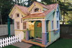 The Whipplewood cottage/playhouse has tremendous style with a cedar shake roof and cottage style charm
