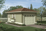 One-car garage has interesting roof line and side window with planter box below