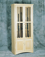 This sturdy gun cabinet keeps guns behind a door that could easily be locked for safety