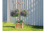 Freestanding hanging planter box hangs two plants and allows flowers to be planted in the square base