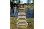 Rustic timber lighthouse is a landscaping delight for your backyard