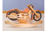 This rustic motorcycle rocker is sure to get the kids in the family excited