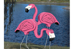 Big 3D flamingos are a fun statement for a tropical or coastal outdoor setting
