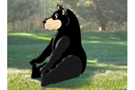A rustic black sitting in the backyard