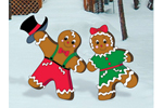 Dancing gingerbread man and woman add light-hearted holiday appeal to your yard