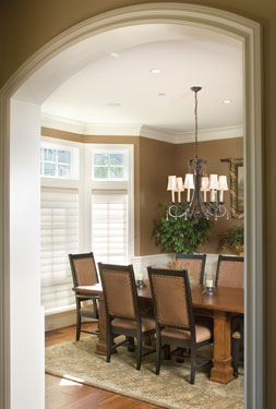dining room with sunny bay window