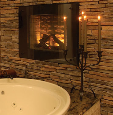 candlelit tub with fireplace