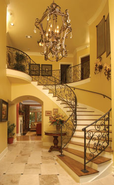 formal entry foyer with chandelier