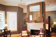 Thumbnail image of master bedroom with large square mirror over fireplace