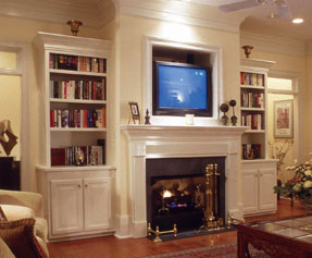 bookcases flanking a living room fireplace