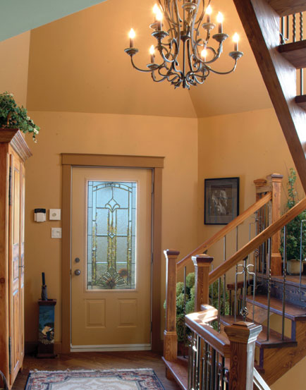 foyer with front door featuring decorative glass foyer with front door featuring decorative glass