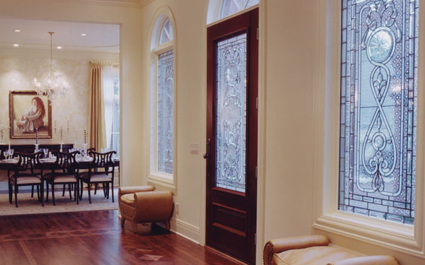 foyer with decorative glass windows and door