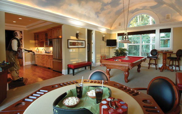 luxurious game room with billiards area