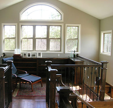 loft with large arched window