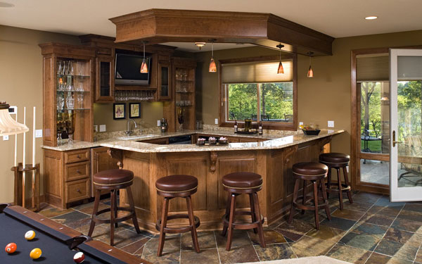 angled wet bar with seating for five people