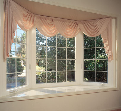 bay window with pink curtains
