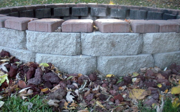 closeup of brick and stone fire pit