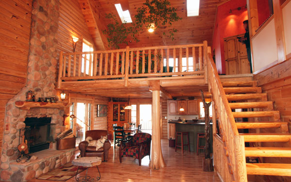 log home with open loft above
