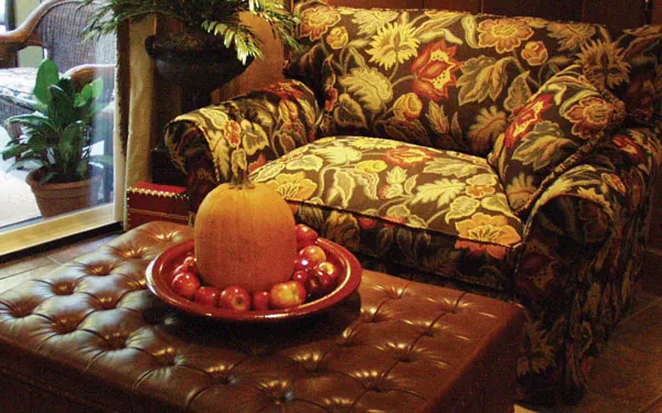 family room in dream home plan with pumpkin decoration