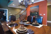 dining room with bold painted wall