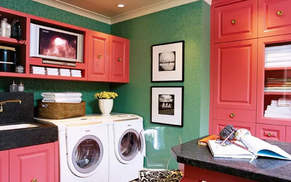 Stylish laundry space with plenty of storage for linens, towels and supplies