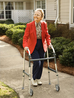 elderly woman using walker