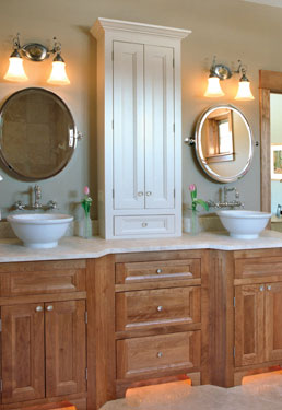 bathroom with extra storage cabinets