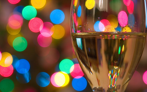 champagne glass with sparkling lights