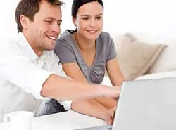 couple looking at computer