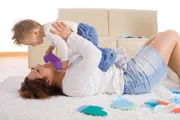 moma nd baby on carpet thumbnail