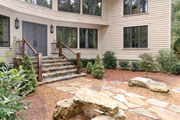 rusic stone walkway to front door of home